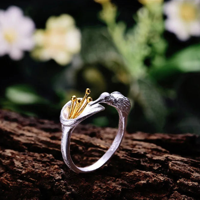 Anillo Ajustable Ave sobre Flor