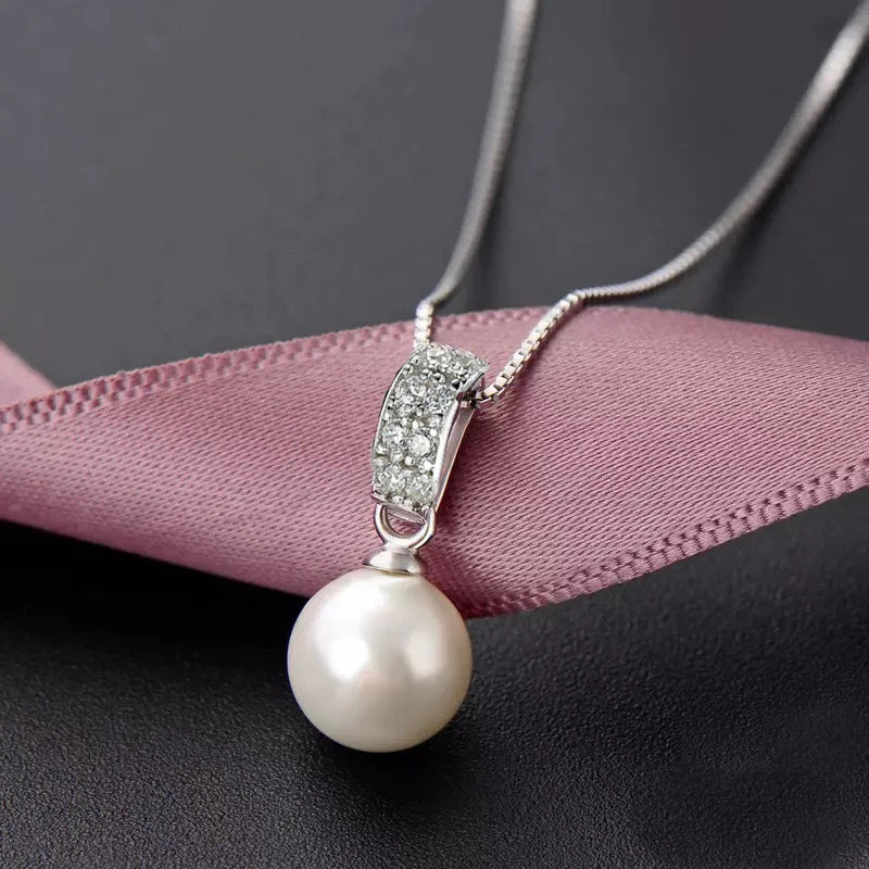 Collar, Perla y Zircones